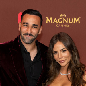 Adil Rami et sa compagne Léna Guillou - Soirée sur la plage Magnum lors du 76e Festival International du Film de Cannes le 22 mai 2023. © Philippe Baldini/Bestimage