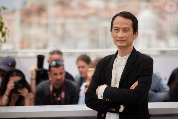Tran Anh Hung au photocall de "La Passion de Dodin Bouffant" lors du 76ème Festival International du Film de Cannes, France, le 25 mai 2023. © Jacovides-Moreau/Bestimage