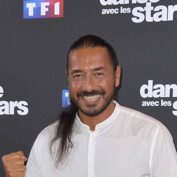 "J'ai les cheveux longs depuis 2003, mon premier Koh-Lanta. C'est un ras-le-bol maintenant", s'est-il justifié.
Moundir Zoughari au photocall de la saison 10 de l'émission "Danse avec les stars" (DALS) au siège de TF1 à Boulogne-Billancourt, France, le 4 septembre 2019. © Veeren/Bestimage