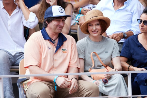 Lukas Delcourt, Elodie Frégé dans les tribunes lors des Internationaux de France de Tennis de Roland Garros 2023. Paris, le 10 juin 2023. © Jacovides-Moreau / Bestimage 