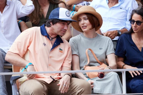 Lukas Delcourt, Elodie Frégé dans les tribunes lors des Internationaux de France de Tennis de Roland Garros 2023. Paris, le 10 juin 2023. © Jacovides-Moreau / Bestimage 