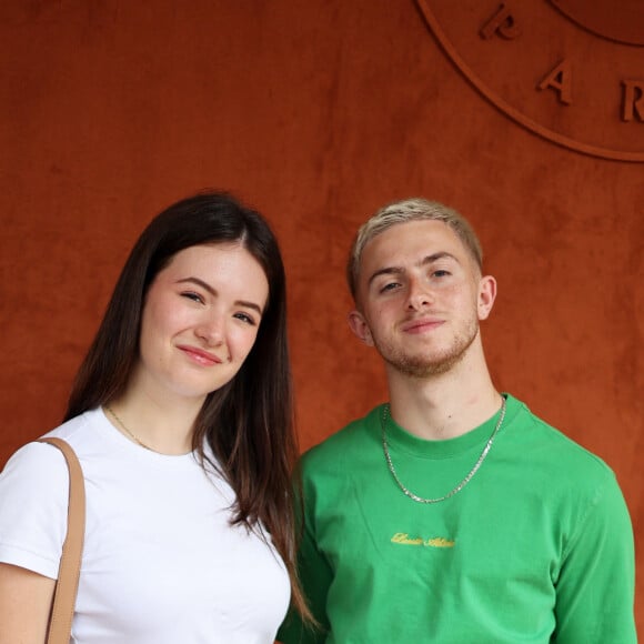 Michou et sa compagne Elsa Bois - Célébrités au Village lors des Internationaux de France de tennis de Roland Garros 2023 à Paris le 10 juin 2023. © Jacovides-Moreau/Bestimage 