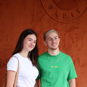 Michou et sa compagne Elsa Bois - Célébrités au Village lors des Internationaux de France de tennis de Roland Garros 2023 à Paris le 10 juin 2023. © Jacovides-Moreau/Bestimage 