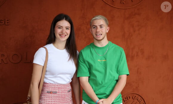 Michou et sa compagne Elsa Bois - Célébrités au Village lors des Internationaux de France de tennis de Roland Garros 2023 à Paris le 10 juin 2023. © Jacovides-Moreau/Bestimage 