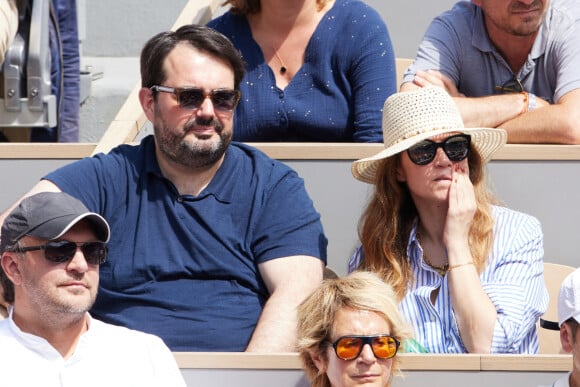 Jean-François Piège et sa femme Elodie dans les tribunes lors des Internationaux de France de Tennis de Roland Garros 2023. Paris, le 10 juin 2023. © Jacovides-Moreau / Bestimage 