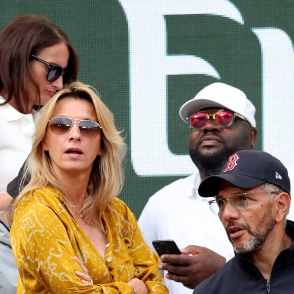 Malgré plusieurs années de couple, ils sont habituellement très discrets. 
Roschdy Zem et sa compagne Sarah Lavoine en tribunes des Internationaux de France de tennis de Roland Garros 2023 à Paris le 11 juin 2023. © Jacovides-Moreau/Bestimage