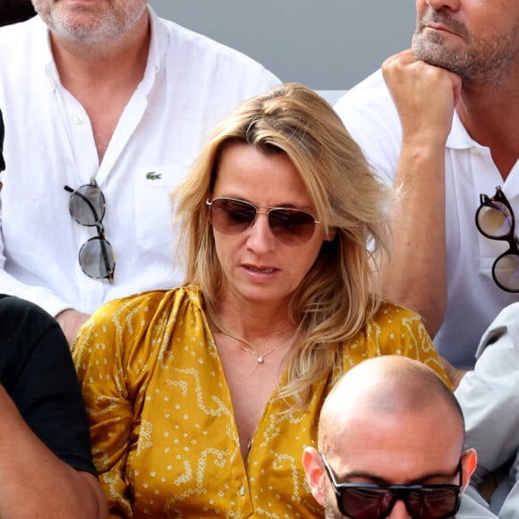 Roschdy Zem et sa compagne Sarah Lavoine en tribunes des Internationaux de France de tennis de Roland Garros 2023 à Paris le 11 juin 2023. © Jacovides-Moreau/Bestimage