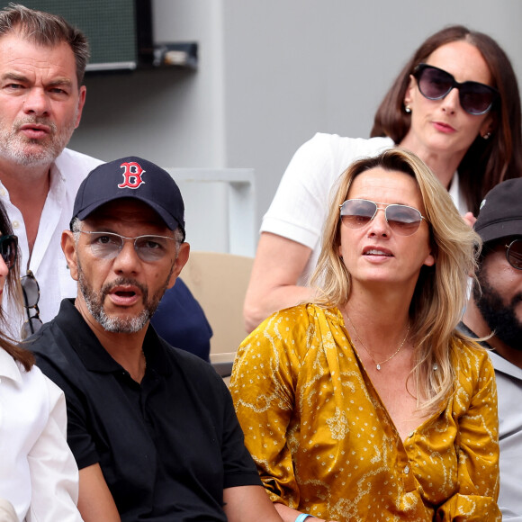 Roschdy Zem et sa compagne Sarah Lavoine en tribunes des Internationaux de France de tennis de Roland Garros 2023 à Paris le 11 juin 2023. © Jacovides-Moreau/Bestimage