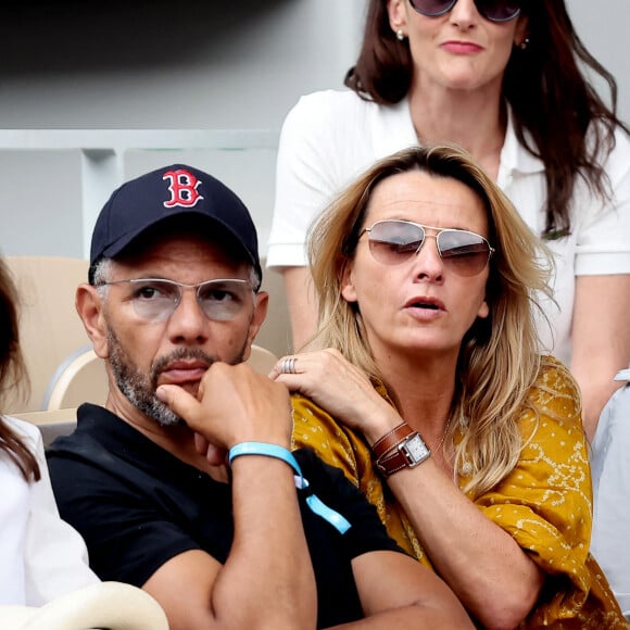 Roschdy Zem et sa compagne Sarah Lavoine en tribunes des Internationaux de France de tennis de Roland Garros 2023 à Paris le 11 juin 2023. © Jacovides-Moreau/Bestimage