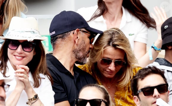 Roschdy Zem et sa compagne Sarah Lavoine en tribunes des Internationaux de France de tennis de Roland Garros 2023 à Paris le 11 juin 2023. © Jacovides-Moreau/Bestimage