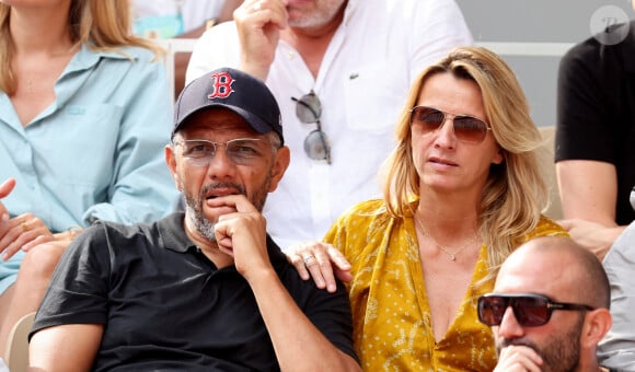 Roschdy Zem et sa compagne Sarah Lavoine en tribunes des Internationaux de France de tennis de Roland Garros 2023 à Paris le 11 juin 2023. © Jacovides-Moreau/Bestimage