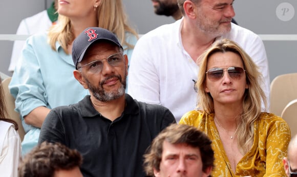 Roschdy Zem et sa compagne Sarah Lavoine en tribunes des Internationaux de France de tennis de Roland Garros 2023 à Paris le 11 juin 2023. © Jacovides-Moreau/Bestimage