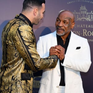 Mike Tyson était l'invité d'exception de cette belle soirée du côté de Biot
 
Adil Rami, Mike Tyson - 9ème gala étoilé Patrick Mouratoglou (coach légendaire de S. Williams) au profit de la Fondation Champ'seed à la Mouratoglou Academy afin de soutenir les jeunes espoirs du tennis mondial à Biot le 18 juin 2023. Un dîner était organisé autour de l'iconique piscine en forme de raquette, suivi d'une vente aux enchères avec des lots prestigieux dont une heure d'entrainement en compagnie de M. Tyson.