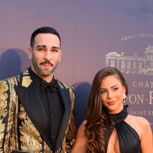 L'occasion pour Adil Rami et Léna Guillou de se retrouver
 
Adil Rami et sa compagne Léna Guillou - 9ème gala étoilé Patrick Mouratoglou (coach légendaire de S. Williams) au profit de la Fondation Champ'seed à la Mouratoglou Academy afin de soutenir les jeunes espoirs du tennis mondial à Biot le 18 juin 2023. Un dîner était organisé autour de l'iconique piscine en forme de raquette, suivi d'une vente aux enchères avec des lots prestigieux dont une heure d'entrainement en compagnie de M. Tyson.