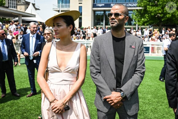 Tony Parker et sa femme Alizé Lim au photocall de la 174ème édition du Prix de Diane Longines à l'hippodrome de Chantilly, France, le 18 juin 2023. © Matthieu Mirville/Bestimage 