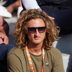 Joalukas Noah ajoute un smiley en train de vomir et simplement "le monde...", pour montrer son écoeurement
Joalukas Noah - Personnalités dans les tribunes lors des internationaux de tennis de Roland Garros le 29 mai 2023. © Moreau / Jacovides / Bestimage