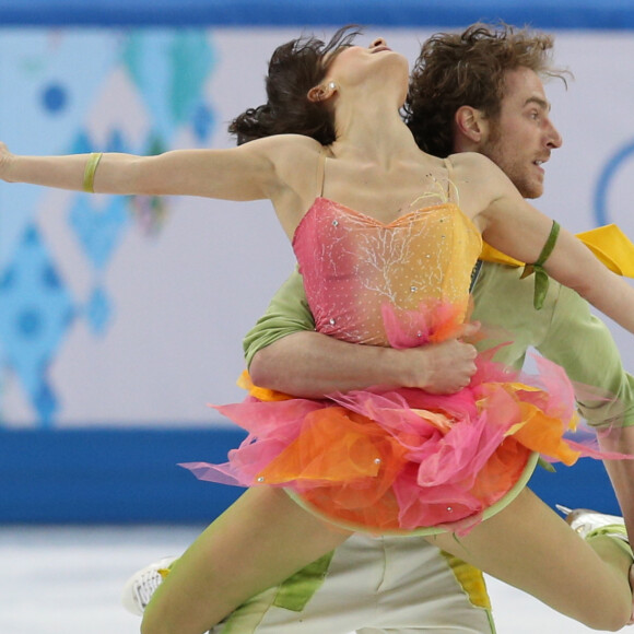 Le couple de patineurs français Nathalie Pechalat et Fabian Bourzat lors de leur programme libre de danse au Iceberg Place Skating pendant les Jeux Olympiques d'Hiver de Sotchi, le 18 février 2014.