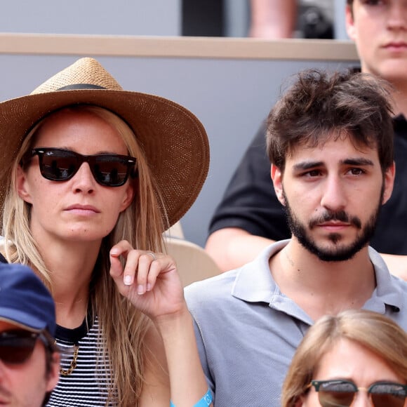 Ben Attal et sa compagne Jordane Crantelle dans les tribunes lors des Internationaux de France de Tennis de Roland Garros 2023. Paris, le 7 juin 2023. © Jacovides-Moreau / Bestimage 