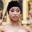 PHOTOS Cardi B : Cheveux voilés et bustier très serré, elle se claque les fesses sur les marches du Petit Palais !