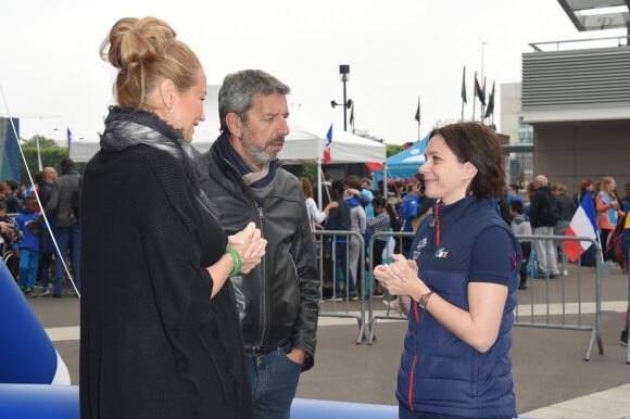 Adriana Karembeu enceinte, Michel Cymes et Nathalie Péchalat - L'association "Premiers de cordée" organisait une journée Evasion où des milliers d'enfants ont participé à des ateliers sportifs encadrés par des parrains de renom au Stade de France à Saint-Denis le 16 mai 2018. © Coadic Guirec/Bestimage