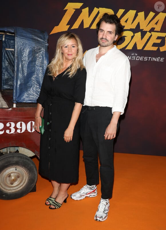 Mais aussi Enora Malagré, qui est aujourd'hui en route pour le mariage avec Hugo
Énora Malagré et son compagnon Hugo Vitrani - Première du film "Indiana Jones et le Cadran de la destinée" au cinéma Le Grand Rex à Paris le 26 juin 2023. © Coadic Guirec/Bestimage