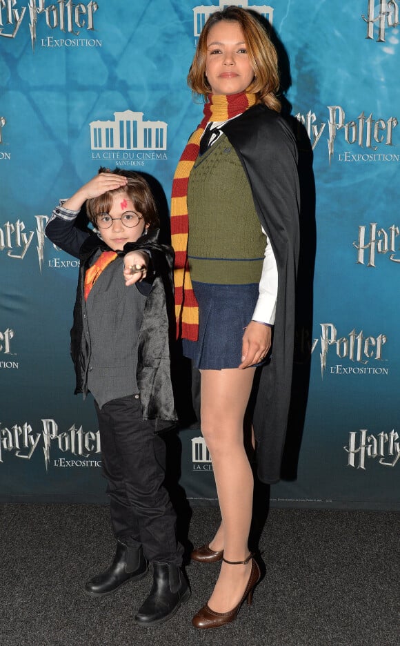 Séverine Ferrer et son fils Milo - Vernissage de l'exposition "Harry Potter" à la Cité du Cinéma à Saint-Denis, le 2 avril 2015.
