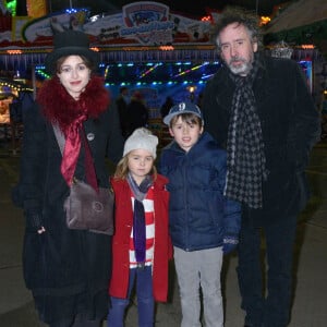 Tim Burton et Helena Bonham Carter emmenent leurs enfants Billy Raymond et Nell dans la fete foraine "Hyde Park Winter Wonderland" a Londres le 21 novembre 2013. Le couple semble heureux, malgre les rumeurs d'infidélite de Tim Burton rapidement dementies. 