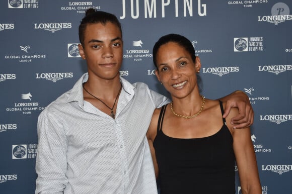 Après une carrière riche en succès, elle a pris sa retraite sportive en 2012
 
Exclusif - Christine Arron et son fils Ethan - Photocall lors du Longines Paris Eiffel Jumping au Champ de Mars à Paris, le 7 juillet 2018. © Borde-Veeren/Bestimage