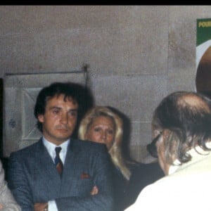 Archives - Romain Sardou lors de son baptême en présence de ses parents Babette et Michel Sardou, de son parrain Alain Delon et de Mireille Darc en 1982. ©Bestimage