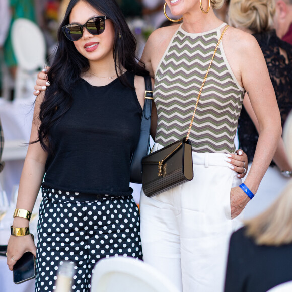 Exclusif - Joy Hallyday et Laeticia Hallyday dans l'Espace VIP lors de la 9ème édition du "Longines Paris Eiffel Jumping" au Champ de Mars à Paris, France, le 25 juin 2023. © Perusseau-Veeren/Bestimage 