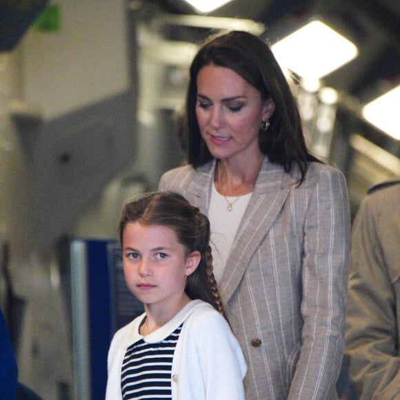 Le prince William, prince de Galles, et Catherine (Kate) Middleton, princesse de Galles, avec leurs enfants le prince George de Galles, et la princesse Charlotte de Galles, lors d'une visite au Royal International Air Tattoo (RIAT) à RAF Fairford, le 14 juillet 2023. 