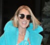 Celine Dion en total look turquoise avec cuissardes et sac banane assorti dans les rues de New York. Le 13 novembre 2019 