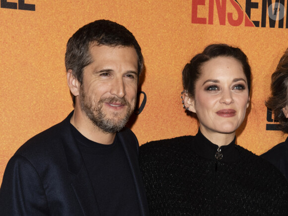 "C'est ma vie privée, ça me regarde. Je peux juste vous dire que nous sommes une famille normale, avec des moments difficiles à traverser, des reconstructions... et que tout va bien."
Guillaume Canet et sa compagne Marion Cotillard - Avant-première du film "Nous finirons ensemble" au Gaumont Opéra à Paris le 29 avril 2019. © Pierre Perusseau/Bestimage