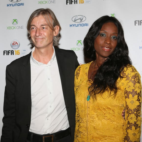 Gilles Verdez et sa compagne Fatou - Soirée de lancement du jeu vidéo "FIFA 2016" au Faust à Paris, le 21 septembre 2015.