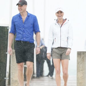 Le prince William, duc de Cambridge, et Catherine (Kate) Middleton, duchesse de Cambridge, assistent à bord d'un bateau de la Bahamas Platinum Jubilee Sailing Regatta à Montagu Bay, l'une des premières régates de voile aux Bahamas depuis le début de la pandémie, le septième jour de leur tournée dans les Caraïbes au nom de la reine pour marquer son jubilé de platine. Nassau, le 25 mars 2022. 