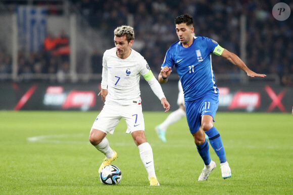 Antoine Griezmann (FRA) vs Anastásios Bakasétas (GRE) - Match de qualification pour l'Euro2024 "Grèce - France (2-2)" à Athènes, le 21 novembre 2023.