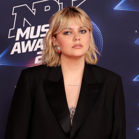 Louane Emera a notamment révélé avoir réalisé toute seule son premier tatouage à l'âge de 16 ans
Louane Emera au photocall de la 25ème cérémonie des "NRJ Music Awards (NMA)" au palais des Festivals et des Congrès de Cannes, France, le 10 novembre 2023. © Dominique Jacovides/Bestimage 