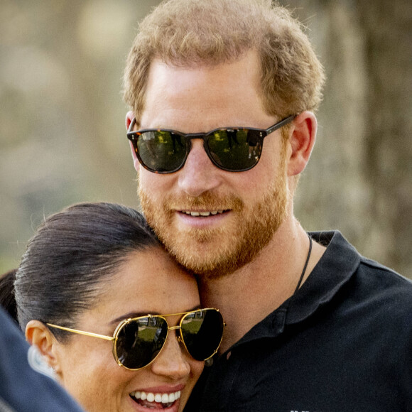 Le prince Harry et Meghan Markle lors du "Land Rover Challenge" au premier jour des Invictus Games 2020 à La Haye, le 16 avril 2022. 