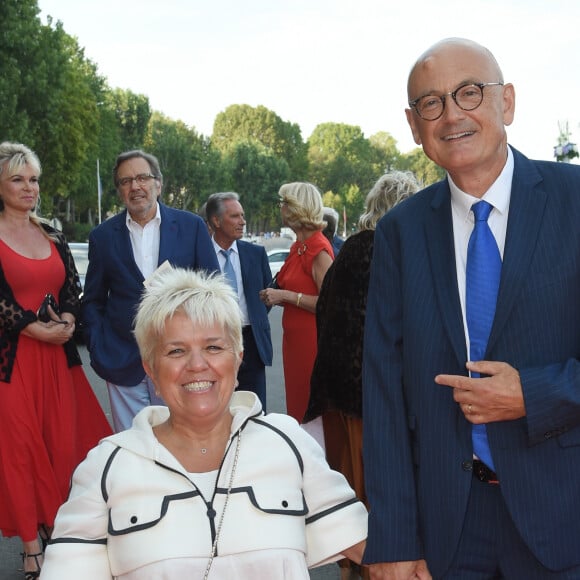 Mimie Mathy et son mari Benoist Gérard - Soirée du 90ème anniversaire de Line Renaud sur le Bateau Potel et Chabot "Pavillon Seine" à Paris le 2 juillet 2018. © Coadic Guirec/Bestimage