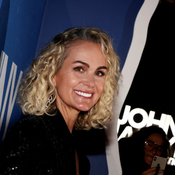 Laeticia Hallyday - Photocall du vernissage de l'exposition "Johnny Hallyday, l'exposition" au Palais des Expositions à Paris. Le 21 décembre 2023 © Dominique Jacovides / Bestimage  