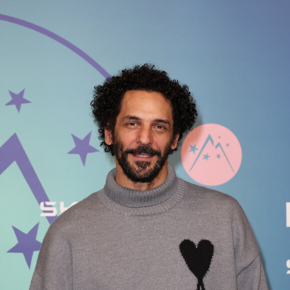 Tomer Sisley au photocall des arrivées de la cérémonie de clôture du 27ème Festival International du Film de Comédie de l'Alpe d'Huez, France, le 20 janvier 2024. © Dominique Jacovides/Bestimage