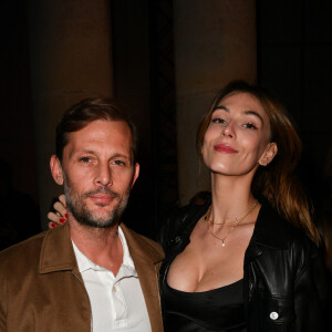 Exclusif - Nicolas Duvauchelle et sa fiancée Chloé Roy - Front row lors du défilé Etam Live Show 2022 dans les jardins des Archives Nationales lors de la fashion week printemps/été 2023 le 27 septembre 2022. © Agence. Bestimage 