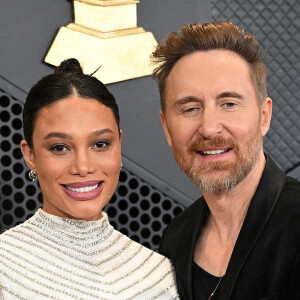 David Guetta et sa compagne Jessica Ledon, enceinte - 66e édition des Grammy Awards à la Crypto.com Arena à Los Angeles le 4 février 2024.