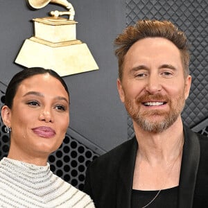 David Guetta et sa compagne Jessica Ledon, enceinte - 66e édition des Grammy Awards à la Crypto.com Arena à Los Angeles le 4 février 2024.