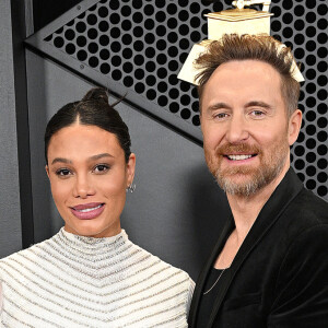 David Guetta et sa compagne Jessica Ledon, enceinte - 66e édition des Grammy Awards à la Crypto.com Arena à Los Angeles le 4 février 2024.