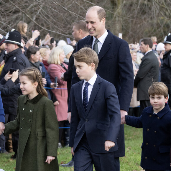 Le prince William, prince de Galles, et Catherine (Kate) Middleton, princesse de Galles, avec leurs enfants le prince George de Galles, la princesse Charlotte de Galles et le prince Louis de Galles - Messe de Noël