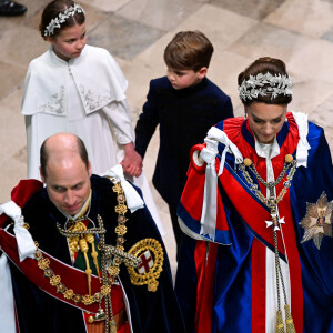 Le prince William, prince de Galles, et Catherine (Kate) Middleton, princesse de Galles, la princesse Charlotte de Galles, et le prince Louis de Galles, lors de la cérémonie de couronnement du roi d'Angleterre à Londres, Royaume Uni, le 6 mai 2023. 