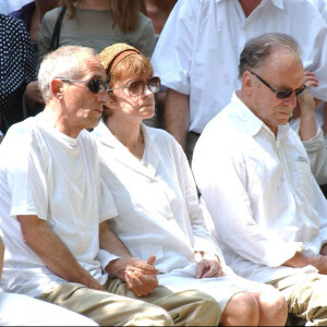 Nadine Trintignant, Alain Corneau et Jean-Louis Trintignant aux obsèques de Marie Trintignant, le 7 août 2003.