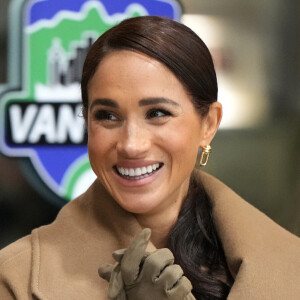 Le prince Harry, duc de Sussex et Meghan Markle, duchesse de Sussex, se joignent participent à un entraînement de curling aux Invictus Games Vancouver Whistler 2025, au Hillcrest Community Centre, Vancouver, Colombie-Britannique, Canada, le 16 février 2024. 