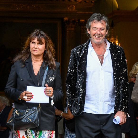 Jean-Luc Reichmann et sa femme Nathalie Lecoultre - Mariage d'Hugues Aufray et de Murielle Mégevand à l'église Saint-Vigor de Marly-Le Roy, France, le 2 septembre 2023. 